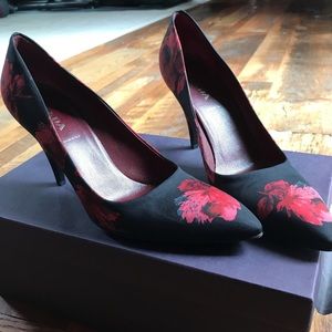 Prada red/black floral pumps.